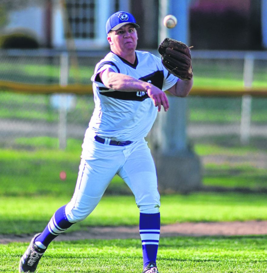 Seymour pitcher Jayden Brown throws the ball to first base for an out during a game against Jennings County on Friday.