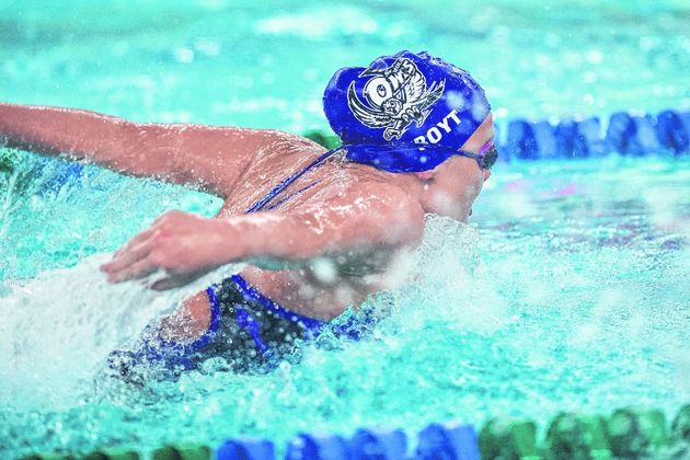 Junior Abby Boyt swims the butterfly in the 200-yard medley relay